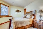 Bedroom with queen bed, and western touches
